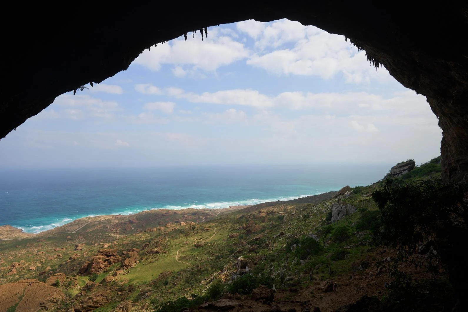 A view of the coast from a cave entrance
